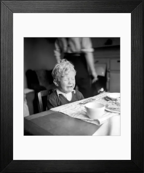 Framed Print : Childrens Expressions: Kenneth Knowles of Manchester seen here at home