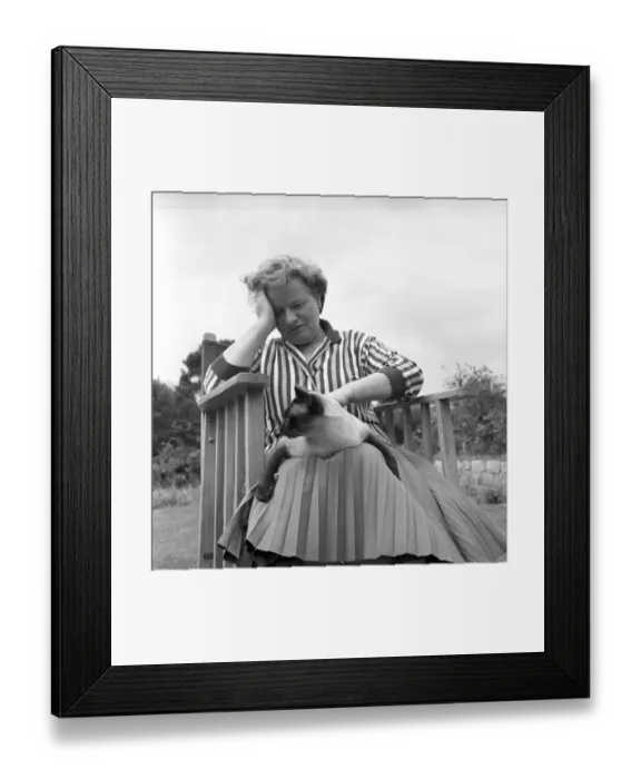 Framed Print : Authoress Janet Green seen here with her cat. 1960