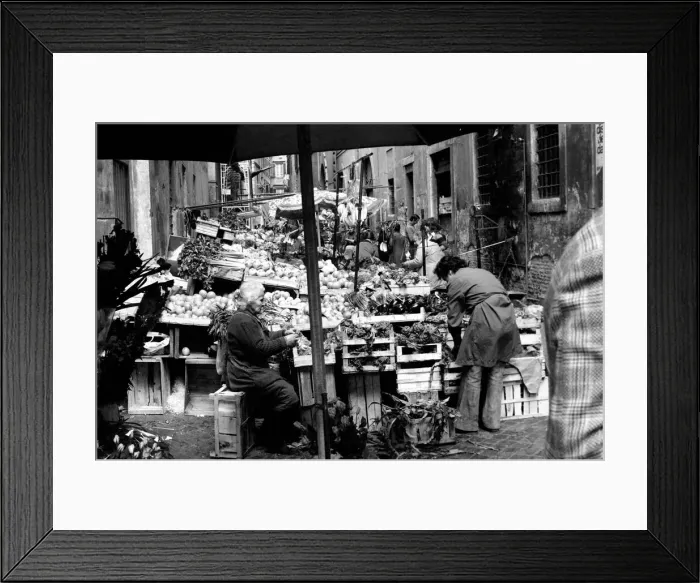 Framed Print : Woman buying fresh fruit and vegetables in a poor suburb on the outskirts of Rome