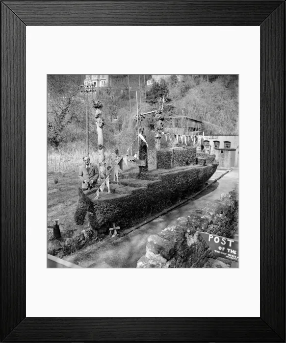 Framed Print : Garden: Humour: J. B. White of Ventnor Isle of Wight with his hedge trimmed like