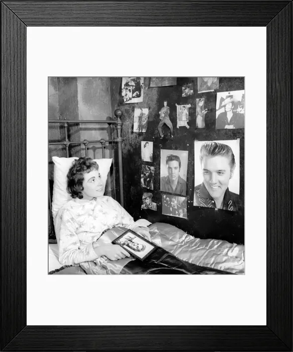 Framed Print : Youth Culture: Miss Robinson who has decorated her bedroom with pictures of Elvis Presley Framed Print : Youth Culture: Miss Robinson who has decorated her bedroom with pictures of Elvis Presley