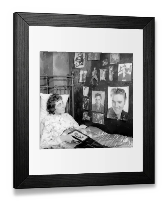 Framed Print : Youth Culture: Miss Robinson who has decorated her bedroom with pictures of Elvis Presley