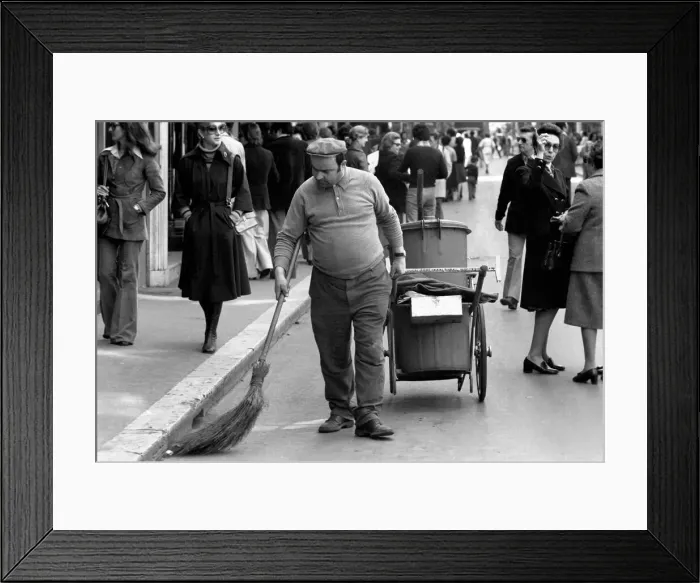 Framed Print : A road sweeper cleaning the streets in a poor suburb on the outskirts of Rome Framed Print : A road sweeper cleaning the streets in a poor suburb on the outskirts of Rome