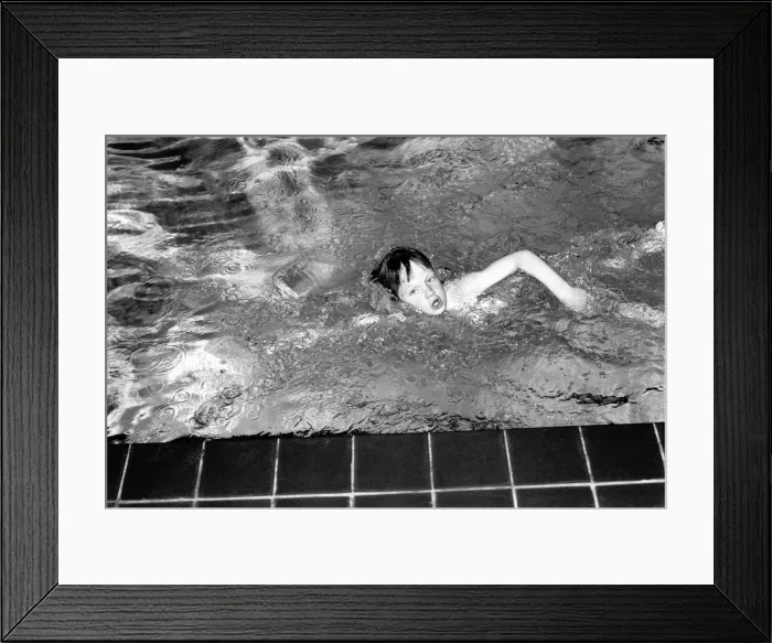 Framed Print : 7 year old Alexander Nice who is a member of the Dover Lifeguard Club