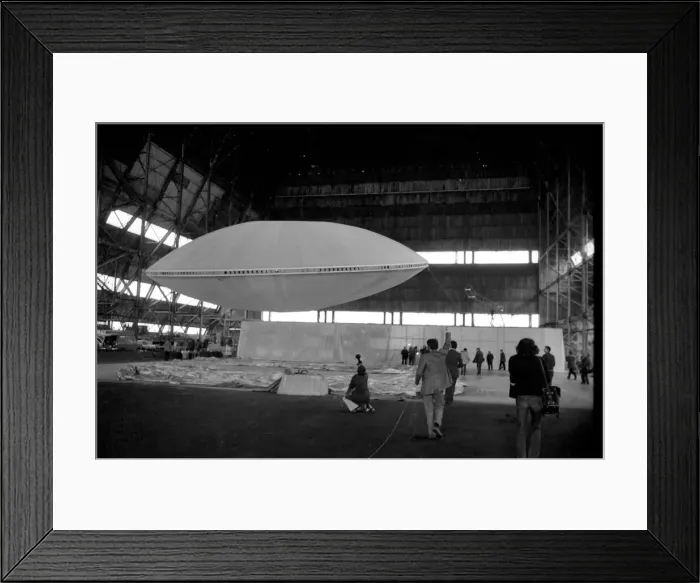 Framed Print : Very quietly, the worlds first flying Saucer, or Skyship as its designers prefer to call Framed Print : Very quietly, the worlds first flying Saucer, or Skyship as its designers prefer to call