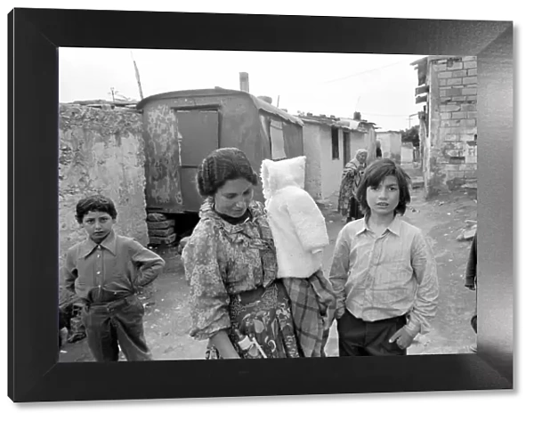 A Mother and children in a poor suburb on the outskirts of Rome, Italy April 1975