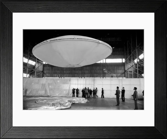 Framed Print : Very quietly, the worlds first flying Saucer, or Skyship as its designers prefer to call Framed Print : Very quietly, the worlds first flying Saucer, or Skyship as its designers prefer to call