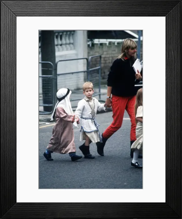Framed Print : Prince Harry arriving at school where he will be playing a shepherd in a nativity play Framed Print : Prince Harry arriving at school where he will be playing a shepherd in a nativity play