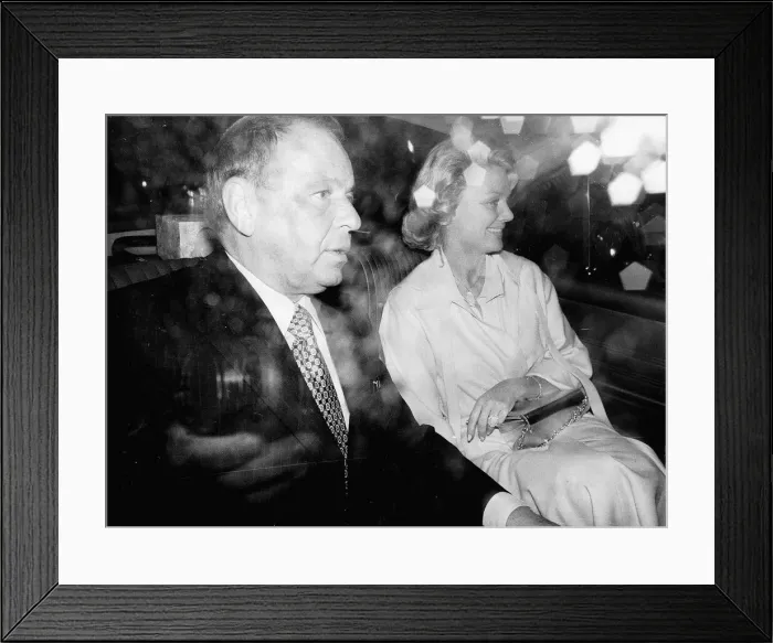 Framed Print : Frank Sinatra and girlfirend Barbara Marx driving in rainy London Framed Print : Frank Sinatra and girlfirend Barbara Marx driving in rainy London