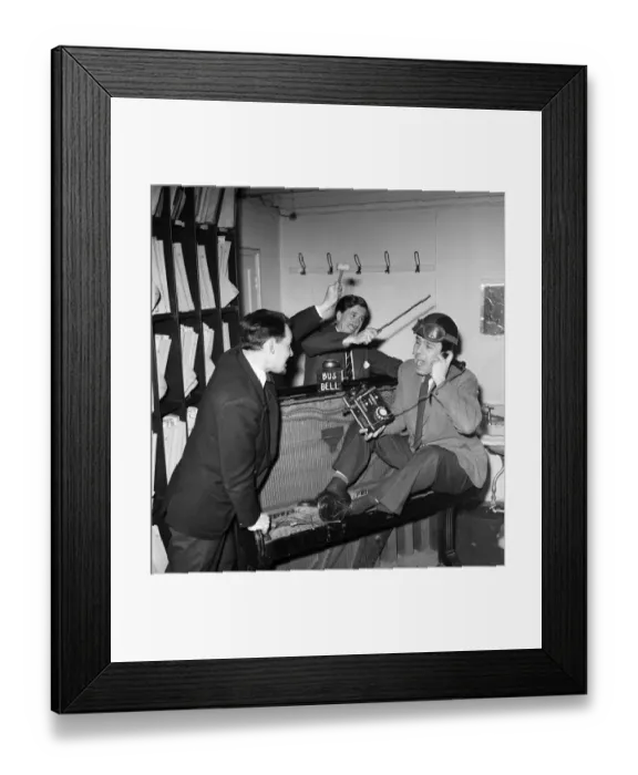 Framed Print : Members of the BBC sounds effects department seen here demonstrating how they get some of