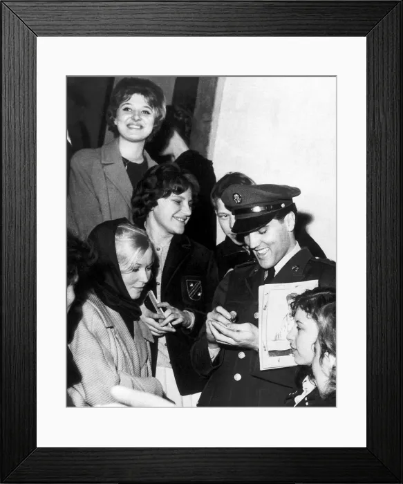 Framed Print : Elvis Presley signing autographs while in Germany on service with the U. S. army