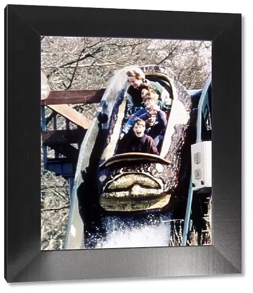 Princess Diana enjoys a day out at the Alton Towers theme park with her two sons Prince