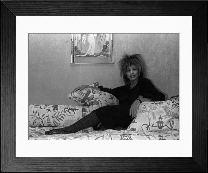 Framed Print : Singer Tina Turner on tour photographed in her hotel room in Paris Framed Print : Singer Tina Turner on tour photographed in her hotel room in Paris