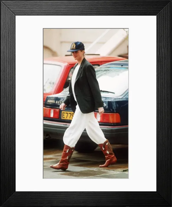 Framed Print : Princess Diana wearing an unusual combination of white trousers, boots Framed Print : Princess Diana wearing an unusual combination of white trousers, boots