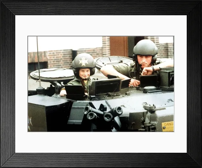 Framed Print : Prince Harry riding in a British Army light tank during a visit to the barracks of Framed Print : Prince Harry riding in a British Army light tank during a visit to the barracks of