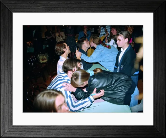 Framed Print : Pop group Take That sign autographs and pose for pictures for girl fans at a signing