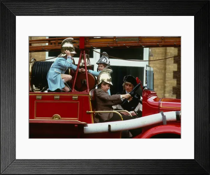 Framed Print : Peter Phillips January 1988 sitting at wheel of old fashioned fire engine Framed Print : Peter Phillips January 1988 sitting at wheel of old fashioned fire engine