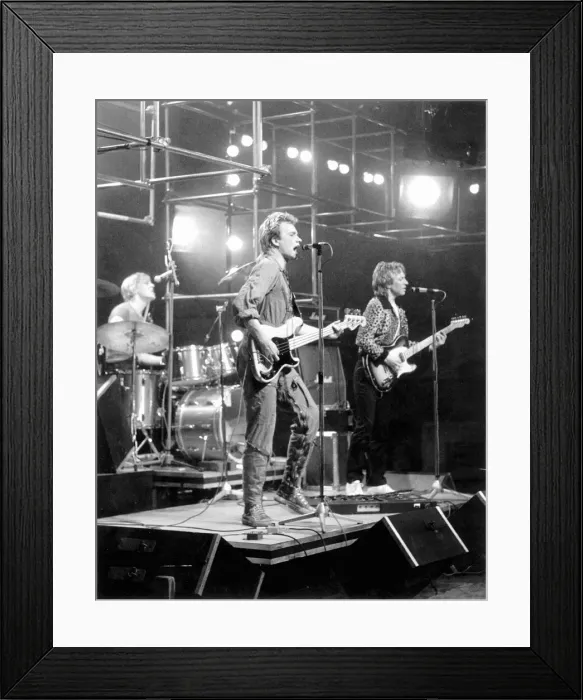 Framed Print : Pop star Sting performing with Police