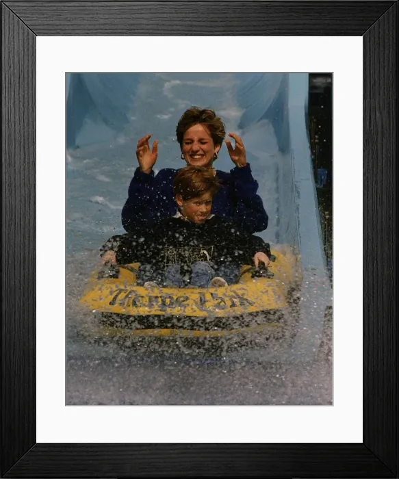Framed Print : Princess Diana and Prince Harry on a water slide ride in Thorpe Park amusement park Framed Print : Princess Diana and Prince Harry on a water slide ride in Thorpe Park amusement park