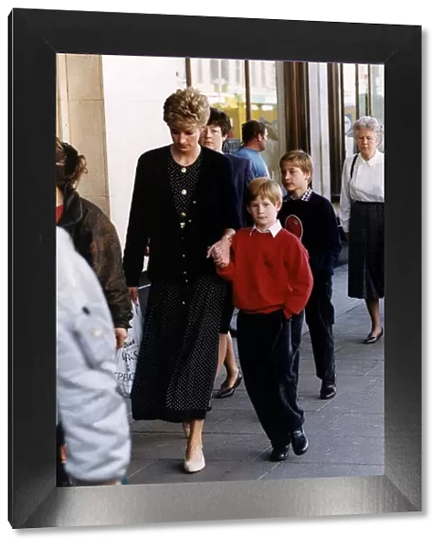 Princess Diana shopping in Kensington High Street, in London with her two sons Prince