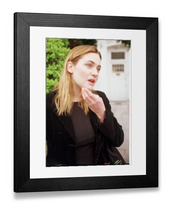 Framed Print : Kate Winslet pauses for thought April 1998 outside her home as she talks to Mirror