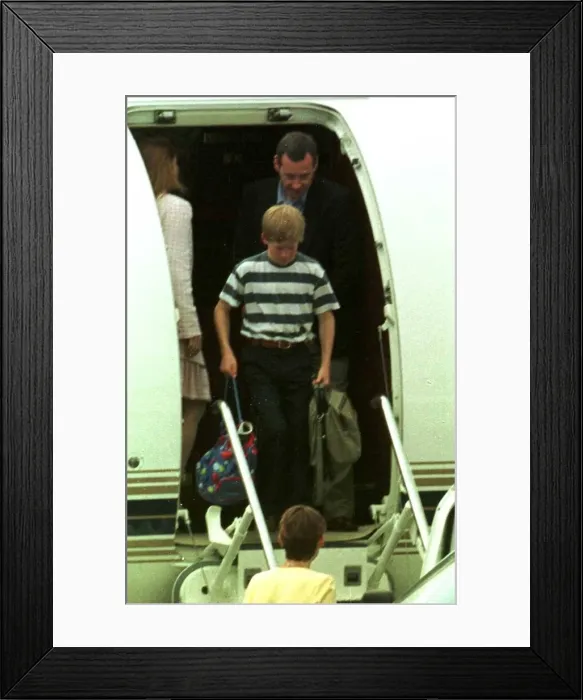 Framed Print : Prince Harry arrives at Cannes airport with brother Prince William