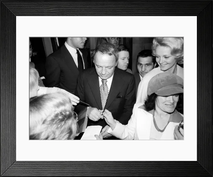 Framed Print : Frank Sintara and his girlfriend Barbara Marx leaving Claridges on the way to Mirabellas Framed Print : Frank Sintara and his girlfriend Barbara Marx leaving Claridges on the way to Mirabellas