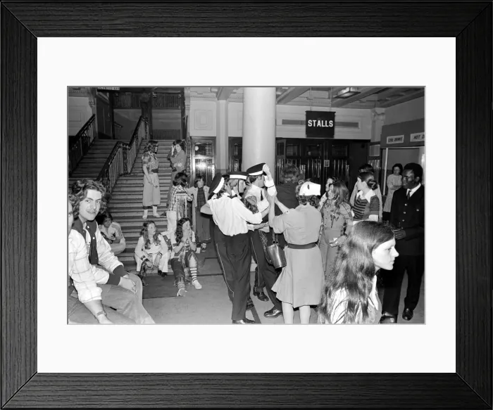 Framed Print : Medical officers attend to injured fans of the Bay City Rollers at their gig in Cardiff