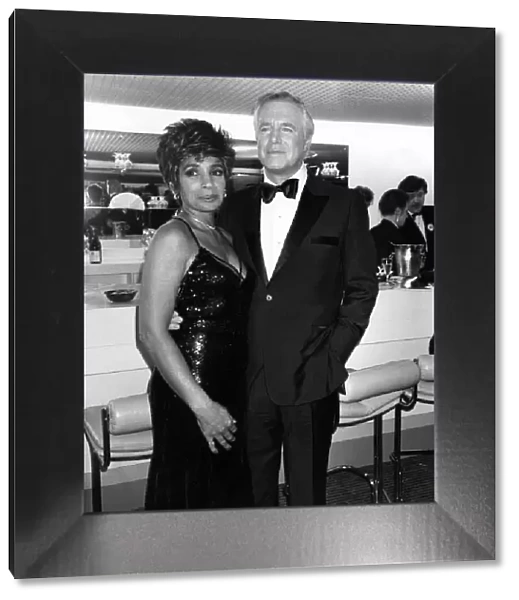 American actor George Peppard with Welsh singer Shirley Bassey. March 1987