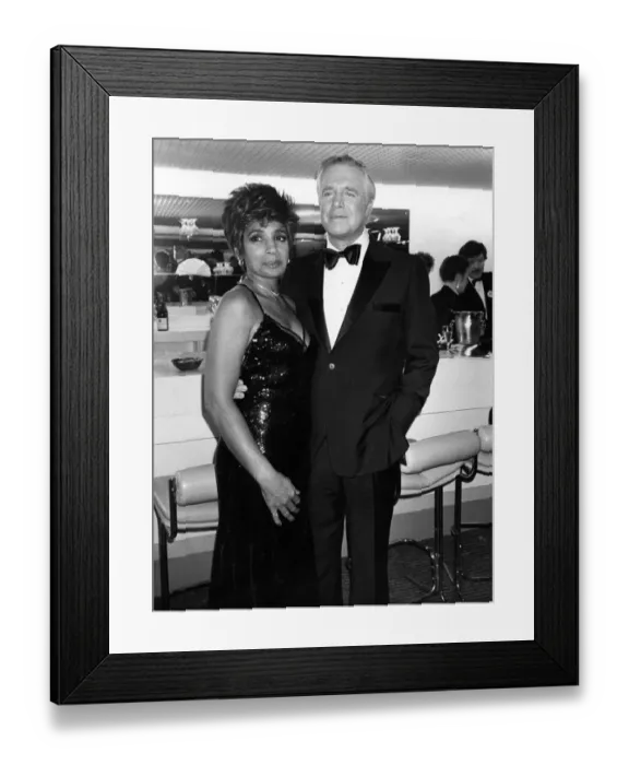 Framed Print : American actor George Peppard with Welsh singer Shirley Bassey. March 1987