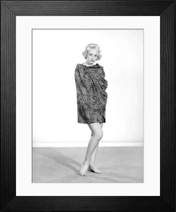 Framed Print : Clothing: Fashion: Beachwear: Woman wearing swimming costume. 1957 B499-001