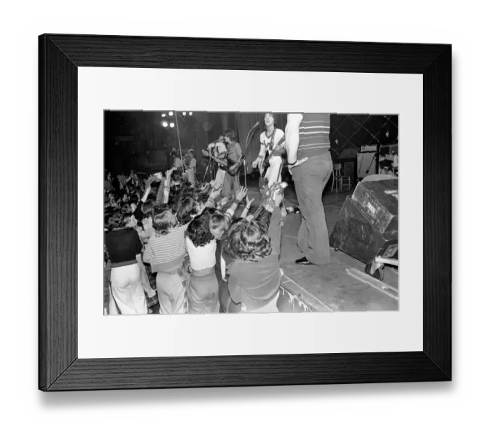 Framed Print : Fans cheer as the Bay City Rollers perform on stage at Cardiff. May 1975 Framed Print : Fans cheer as the Bay City Rollers perform on stage at Cardiff. May 1975