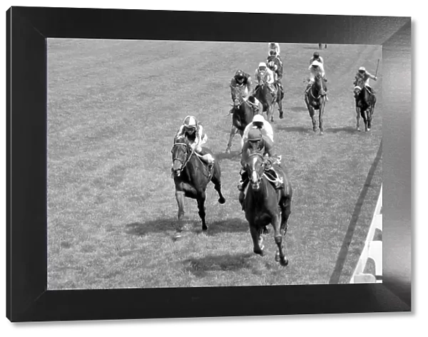 Action from the Oaks at Epsom, which was won by jockey Willie Carson