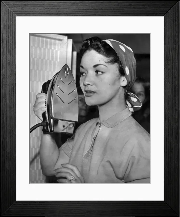 Framed Print : Lita Rosa opens Home Comforts Exhibition. She still tries the iron the old fashioned way Framed Print : Lita Rosa opens Home Comforts Exhibition. She still tries the iron the old fashioned way