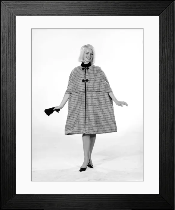 Framed Print : Model Vyvyan Dunbar wearing check cape which can be worn either full length or quarter Framed Print : Model Vyvyan Dunbar wearing check cape which can be worn either full length or quarter