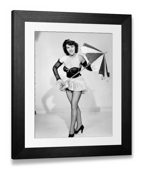 Framed Print : Show girl with umbrella. circa 1957 Framed Print : Show girl with umbrella. circa 1957