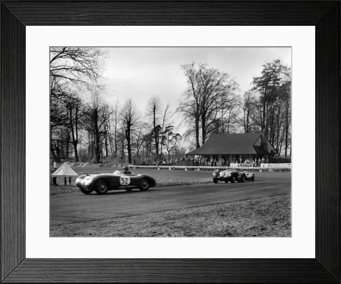Framed Print : British Empire Trophy Race at Oulton Park. APR Rolt in a Jaguar leads J Framed Print : British Empire Trophy Race at Oulton Park. APR Rolt in a Jaguar leads J