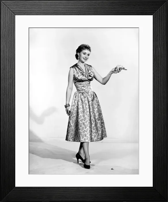 Framed Print : Woman wearing silk summer dress. Circa 1955