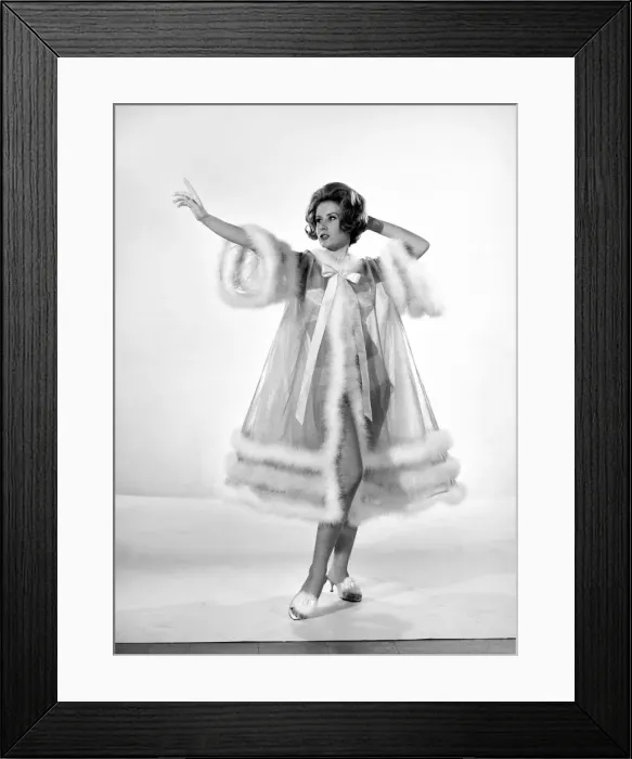 Framed Print : Model Rita Royce wearing marabou fur trimmed nightie. December 1963