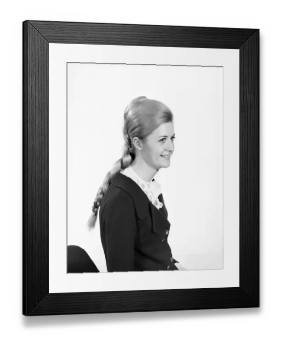 Framed Print : Woman at the beauty department of Selfridges store having a Tovar- tress attached to her