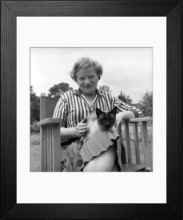 Framed Print : Authoress Janet Green seen here with her cat. 1960 Framed Print : Authoress Janet Green seen here with her cat. 1960