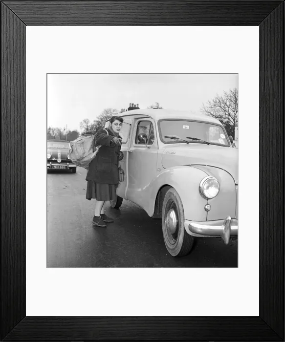 Framed Print : Girl hitch-hiking on the A30. to Southampton Circa 1957 Framed Print : Girl hitch-hiking on the A30. to Southampton Circa 1957