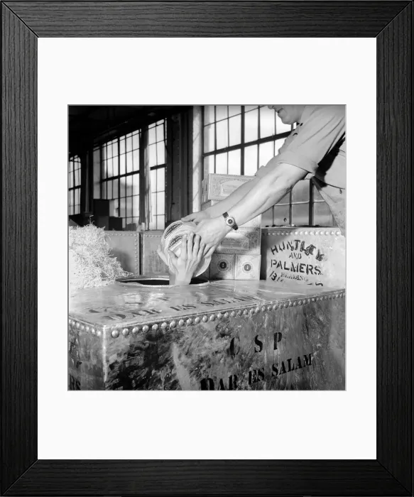 Framed Print : Huntley and Palmer Biscuits: Boys in biscuit factory seen here loading crate for export