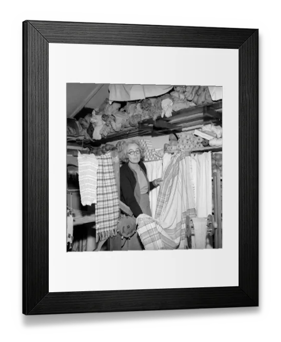 Framed Print : Woman seen here with rolls of material she has woven with her loom. 1955
