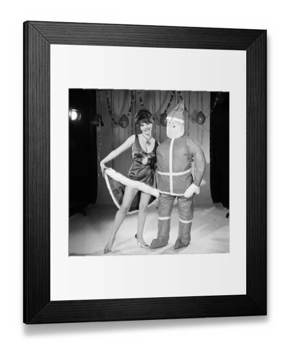 Framed Print : Model Kim Tracy seen here dressed for the office Christmas Party. 1960 E479-010