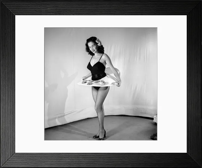 Framed Print : Tea for two: Woman wearing tea cup skirt. 1959 E38-005 Framed Print : Tea for two: Woman wearing tea cup skirt. 1959 E38-005