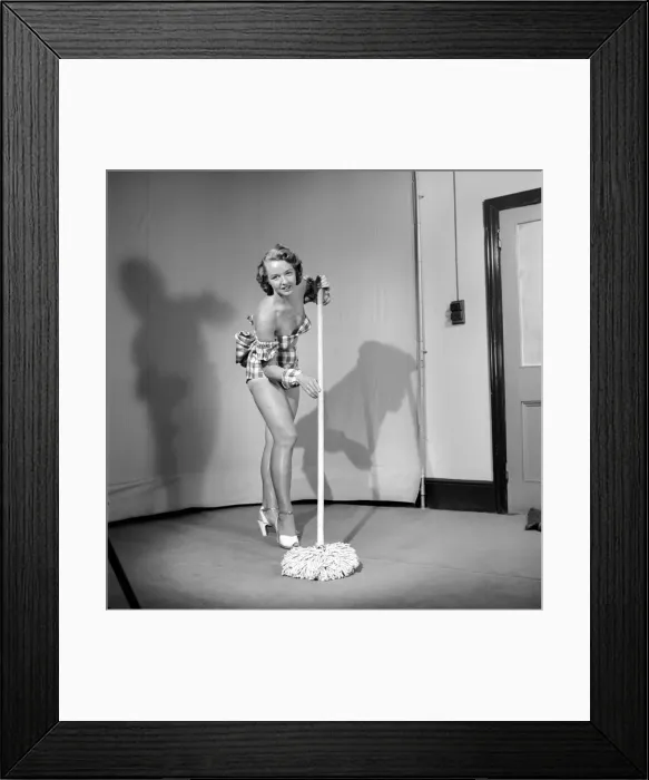 Framed Print : Cleaner wearing fancy dress. 1966 E25-005