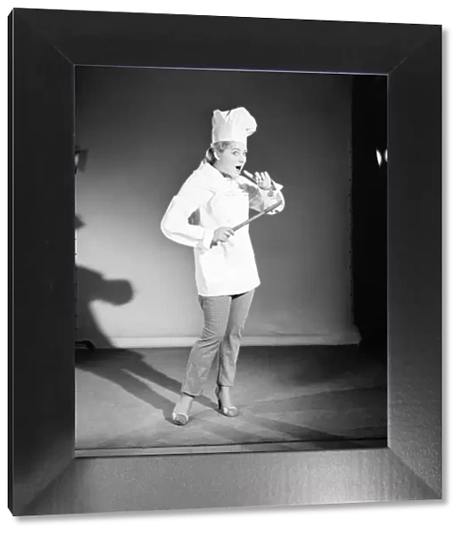 Model dressed as a chef. 1959 E250-012