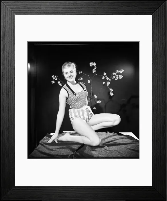 Framed Print : Ruth Calvert seen here modelling the latest 1959 springtime fashions posing with blossom
