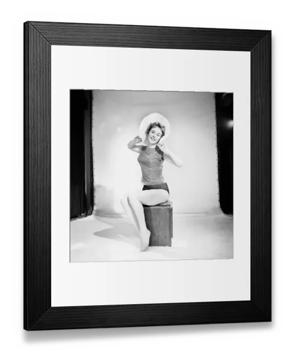 Framed Print : Model Darien Leigh seen here modelling the latest hat fashions. 1965